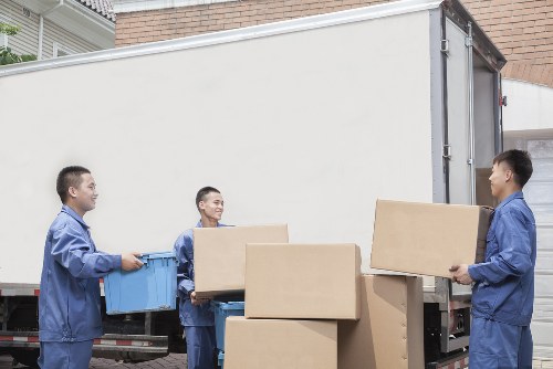 Professional Balham movers handling boxes with care
