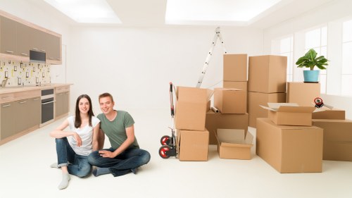 Packed office furniture and equipment ready for a business move