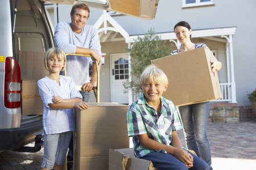 Loading furniture into a moving truck in Balham